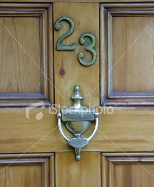 20070604115739-ist2-427493-number-23-on-a-door-with-knocker.jpg